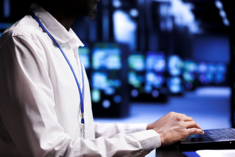 Admin examining supercomputer